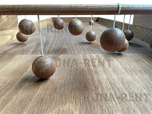foto van houten volksspel hangballen